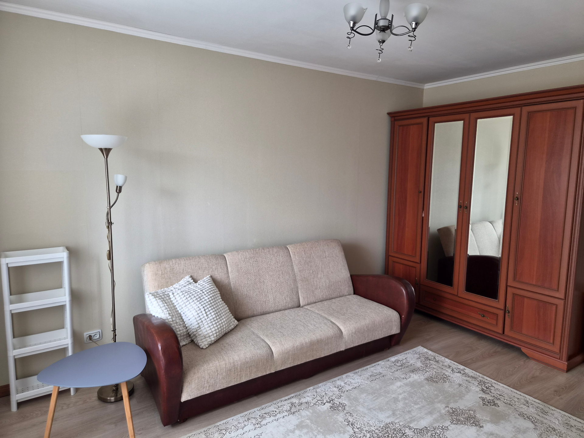 Living room from another angle with wardrobe